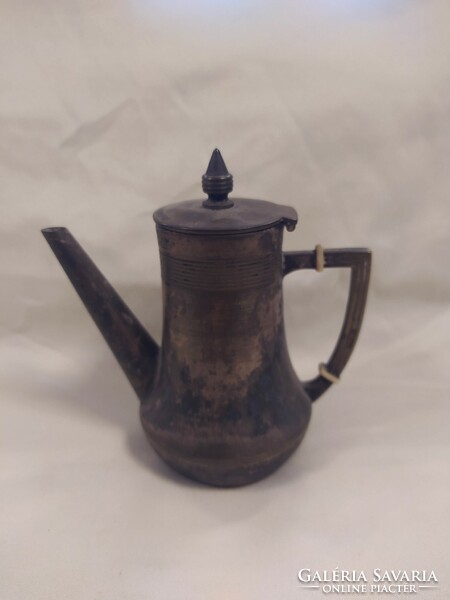 Antique metal spout with lid