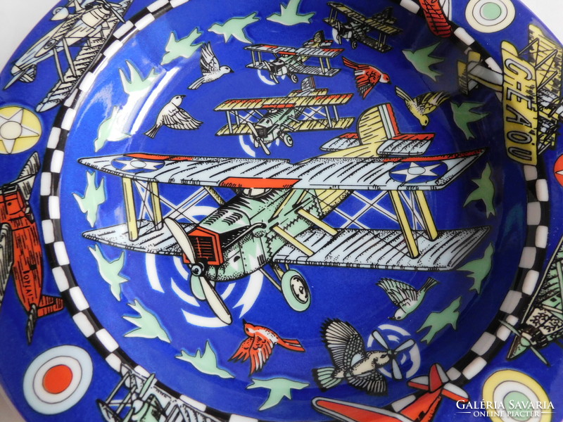 Swiss children's plate with old airplanes