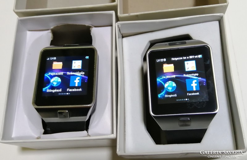 2 smart watches for sale, smart watches with sim and memory cards! With charging cables, (like new) + 1 battery!