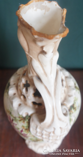 A richly decorated porcelain vase with a flower pattern