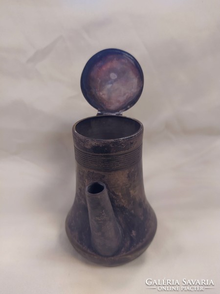 Antique metal spout with lid