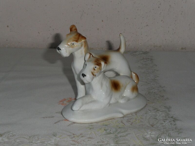 Older German porcelain dog figurine, nipple