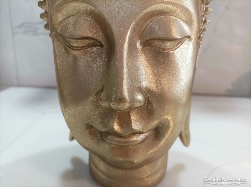 Buddha head, golden color