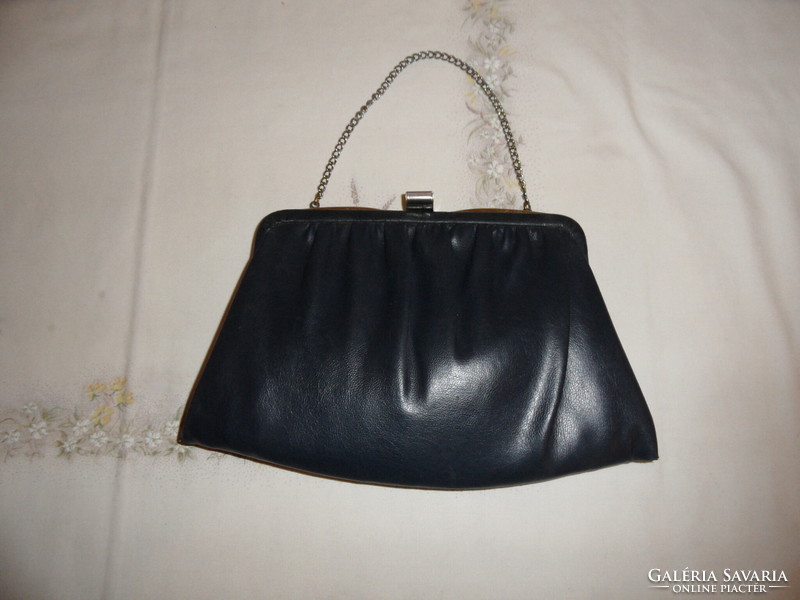 Old blue imitation leather radish in women's bag