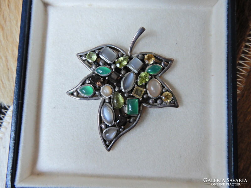 Silver maple leaf pendant with semi and precious stones