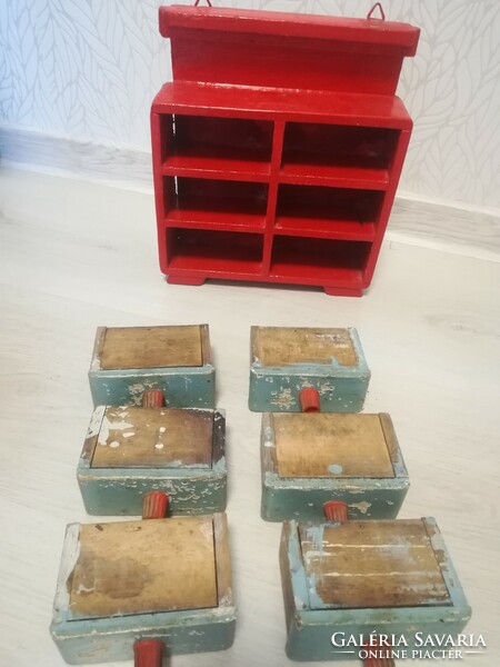 Old wooden spice rack with 6 drawers