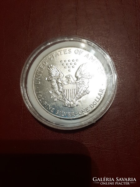Silver in one dollar (2010) capsule