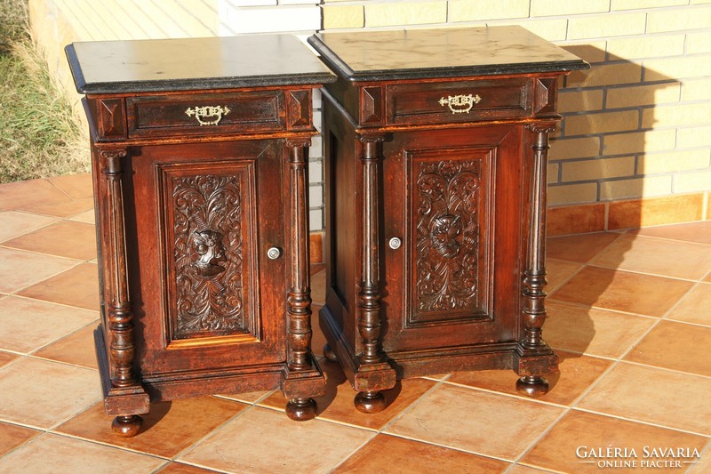 A pair of German pewter, marble-top, carved bedside tables, left-right