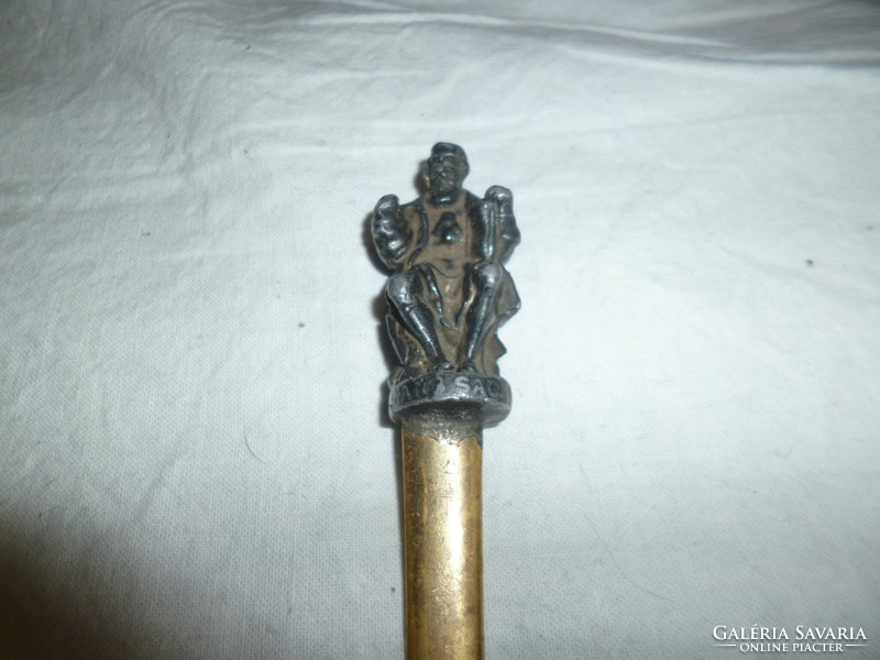 Antique metal leaf-cutting knife with sculpture figure