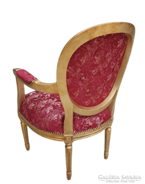 Gold-colored armchair armchair with vintage new upholstery