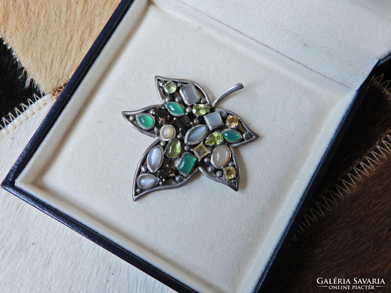 Silver maple leaf pendant with semi and precious stones