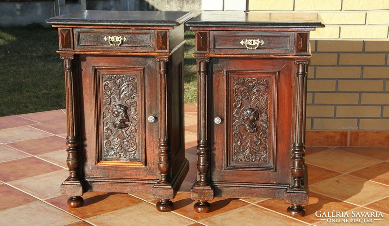 A pair of German pewter, marble-top, carved bedside tables, left-right