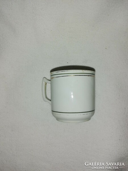 Vintage coffee cup with a plastic embossed pattern