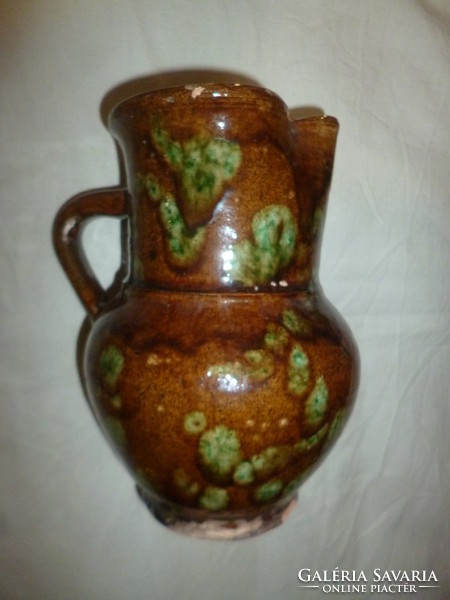 Antique folk glazed earthenware jug