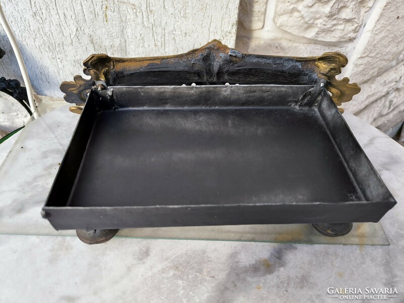 Beautiful old stove front fireplace with a decorative front. Spark arresting ash