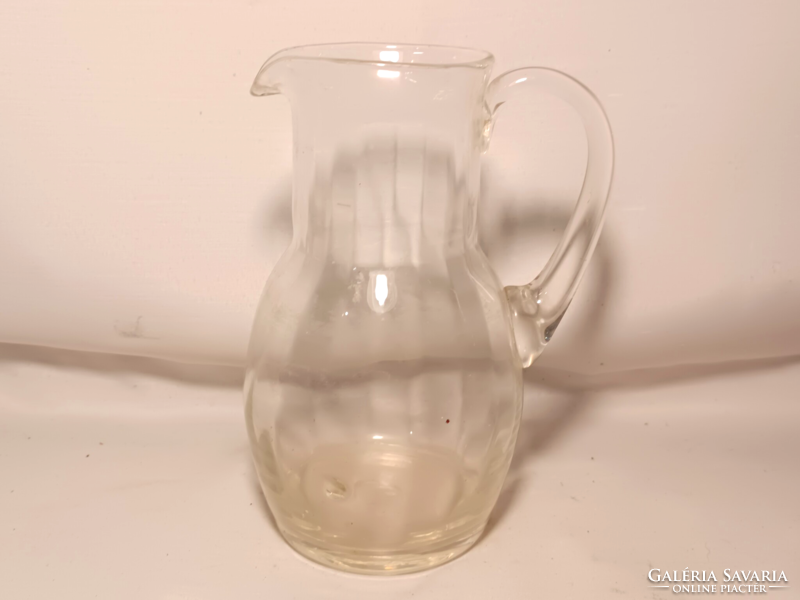 Small broken glass jug