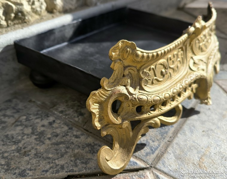 Beautiful old stove front fireplace with a decorative front. Spark arresting ash