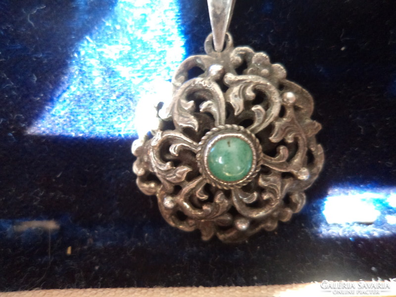 Antique silver openwork pendant with emerald (?) Green stone