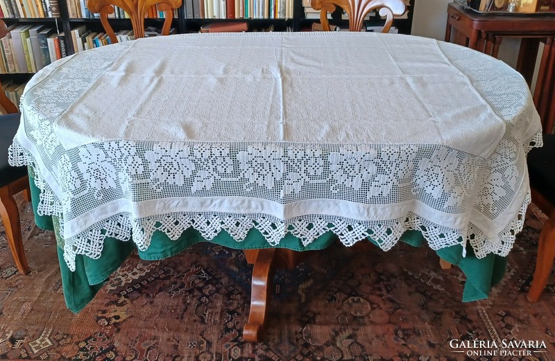 Antique handmade linen tablecloth with wide lace inserts and border