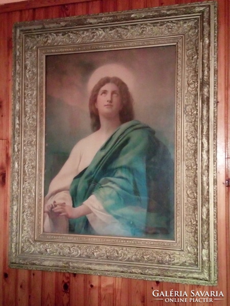 A large old holy image in a special frame.