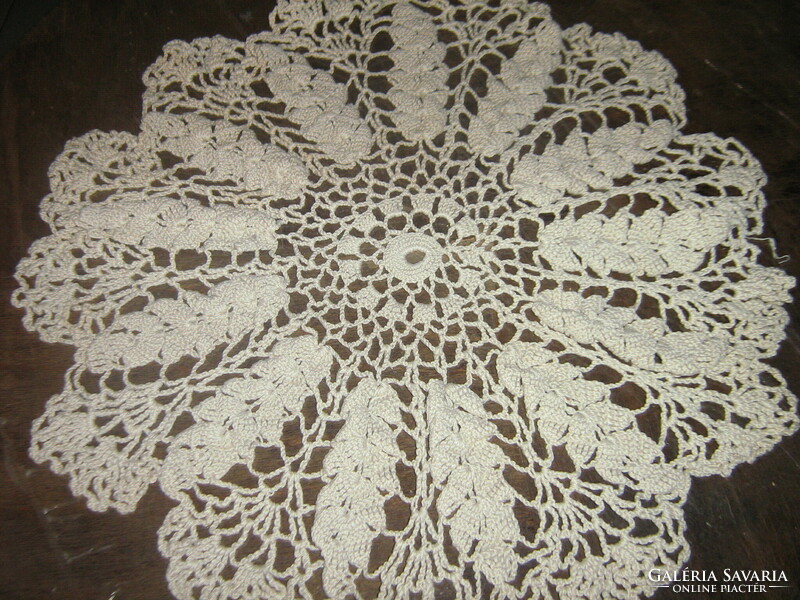Beautiful round lace tablecloth hand-crocheted in round