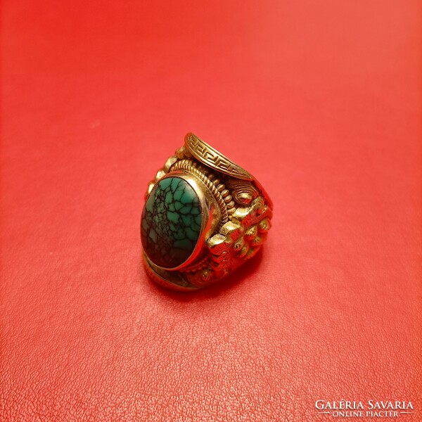 Huge silver ring with green stones