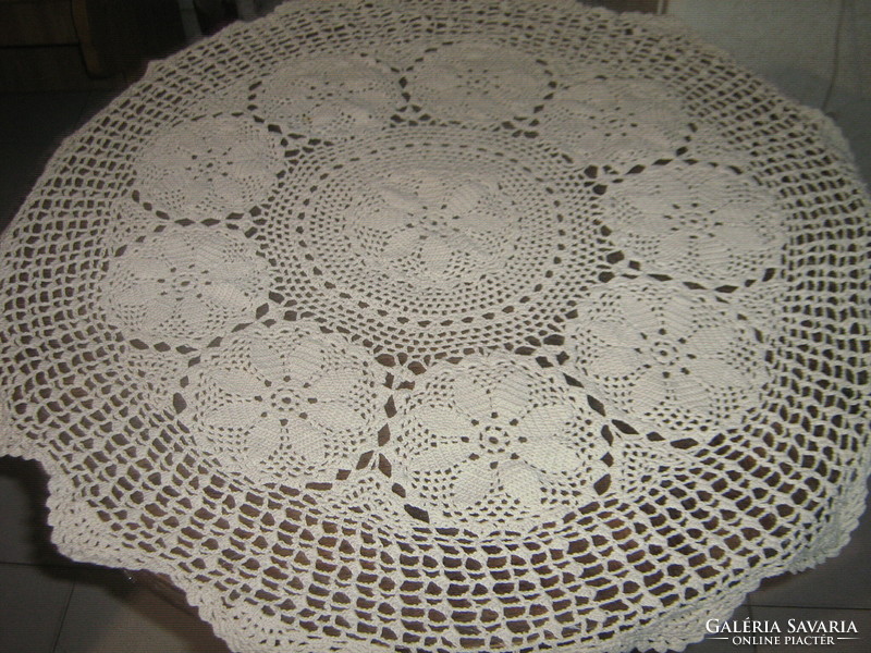 Beautiful antique hand-crocheted ecru round tablecloth