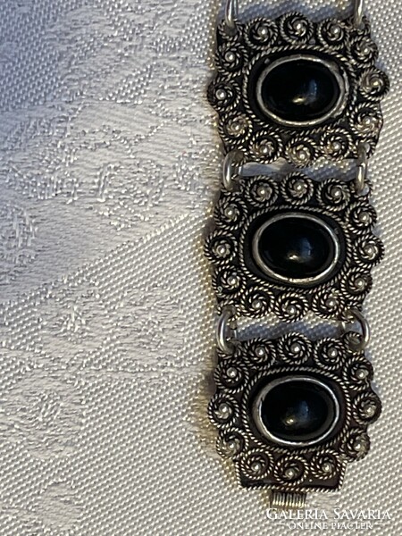 Antique beautiful silver bracelet with black stones.