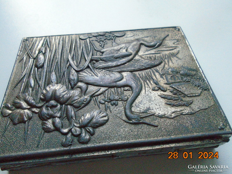 Japanese box with embossed crane and iris pattern on the lid, miniature embossed panoramic landscape on the sides