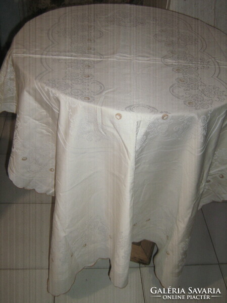 Beautiful embroidered damask tablecloth with a sling edge