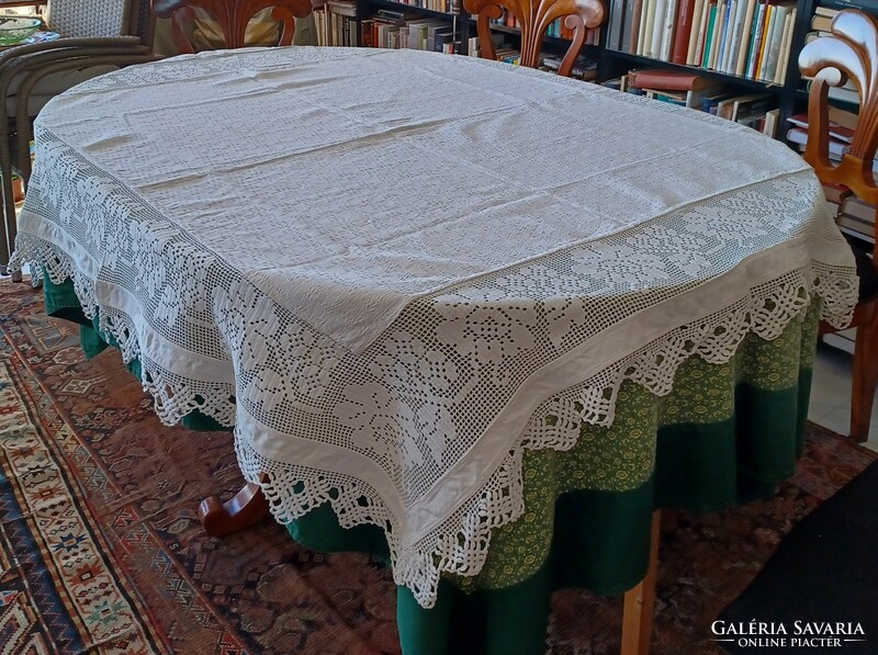 Antique handmade linen tablecloth with wide lace inserts and border