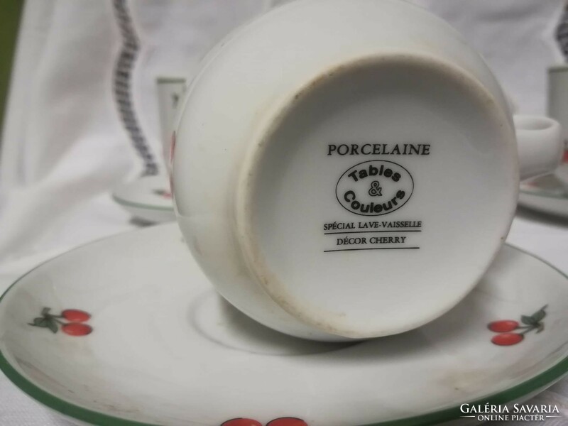Porcelain coffee sets with a cherry pattern, with a green rim