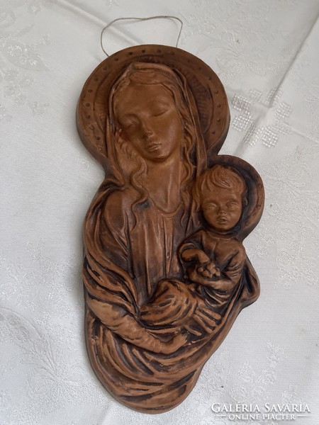 Ceramic image of Mary with baby Jesus.