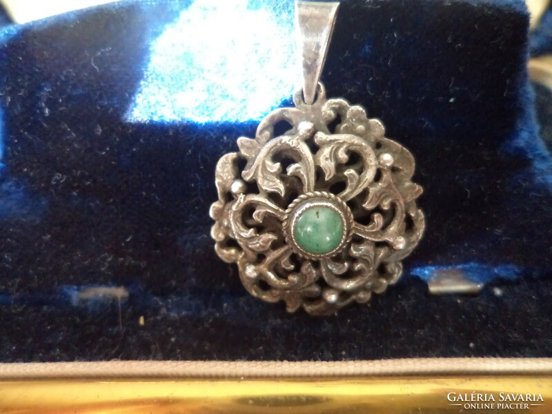 Antique silver openwork pendant with emerald (?) Green stone