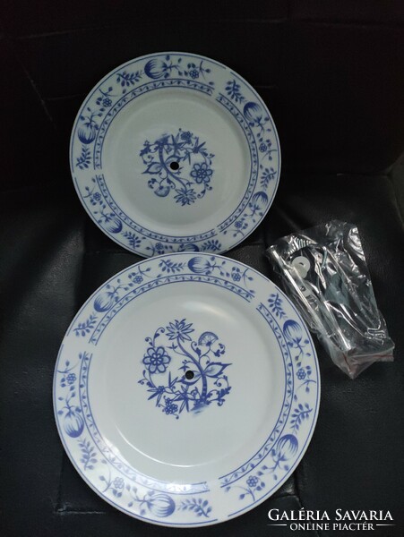 White porcelain cake stand with a blue pattern.