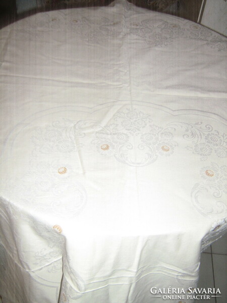 Beautiful embroidered damask tablecloth with a sling edge