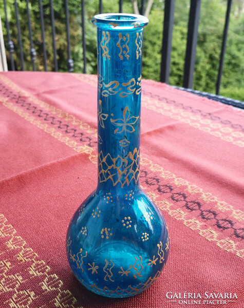 Small blue glass vase with hand-painted gold decoration. 19 cm high.