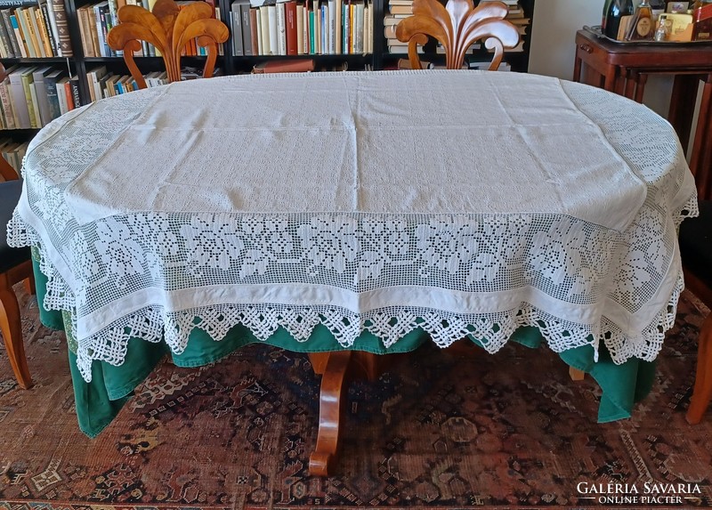 Antique handmade linen tablecloth with wide lace inserts and border