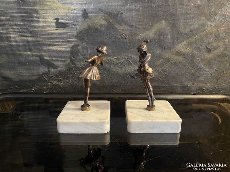 Pair of bronze dancing statues