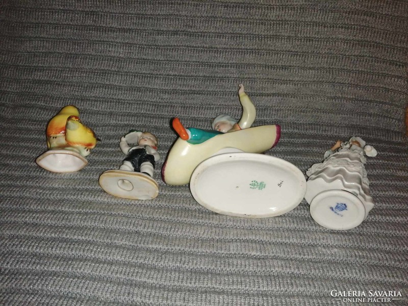 4 defective porcelain figurines in one