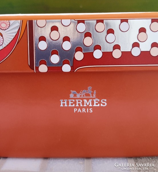 Gift box decorated with Hermes cirque du soleil inspired graphics