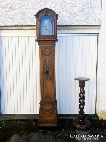 Antique standing clock.