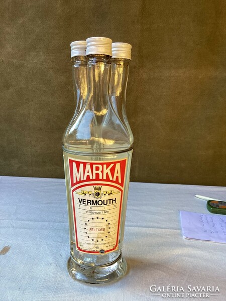 Old three neck brand vermouth bottle.