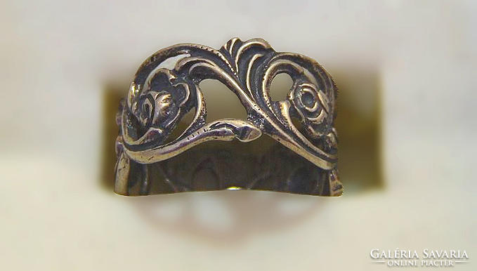 Antique secession-style silver wedding ring in a circle with a rose flower tendril motif wedding ring