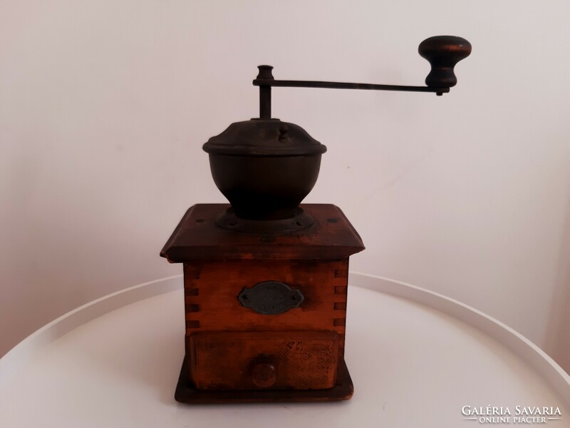 Old wooden reform coffee grinder