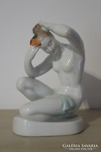 Aquincum girl pinning a bun, porcelain figure