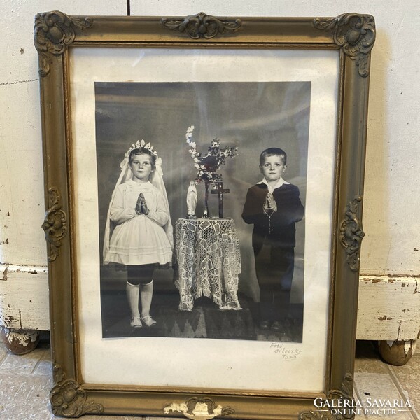 Antique picture frame with a photo in Turkish folk costume