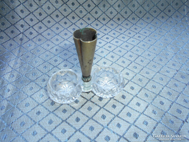 Table salt shaker with polished glass, copper toothpick holder on antique plates