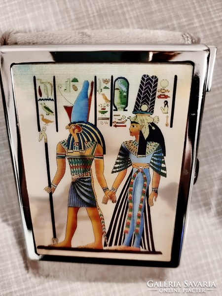 Metal cigarette case decorated with an Egyptian hologram image