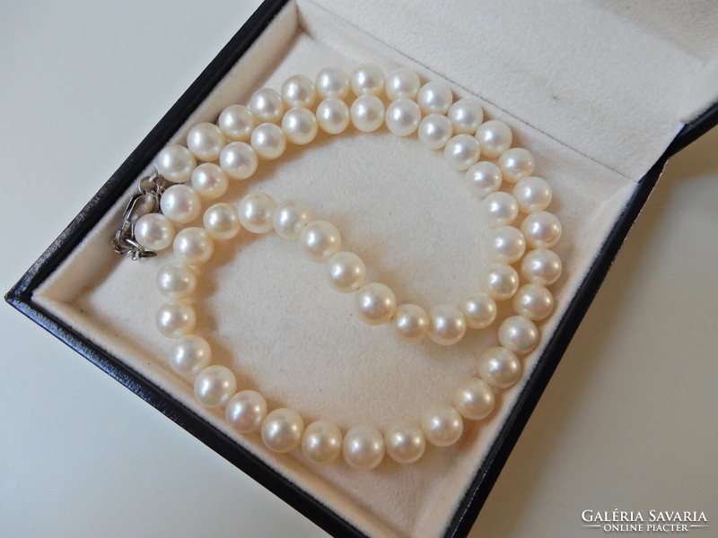 Genuine freshwater pearl string with silver clasp